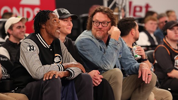 Luc Longley (right), pictured with former Chicago Bulls teammate Scottie Pippen, has a small stake in the Sydney Kings.