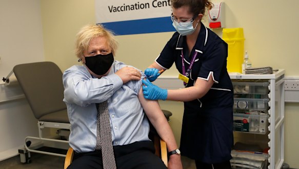 British Prime Minister Boris Johnson receives the AstraZeneca vaccine in March.
