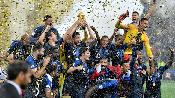 France's Olivier Giroud lifts the trophy after France defeated Croatia 4-2.