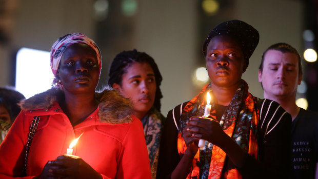 Mourners at Sunday's vigil.