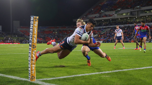 Joseph Suaalii dives over for his second try against the Knights.