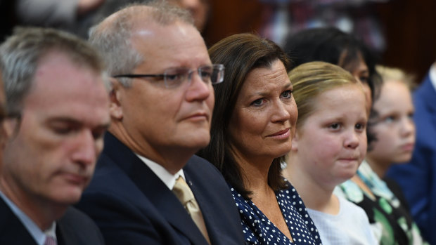 Scott Morrison at a Coptic church service on Sunday. He says love will defeat the division right-wing extremists seek to provoke