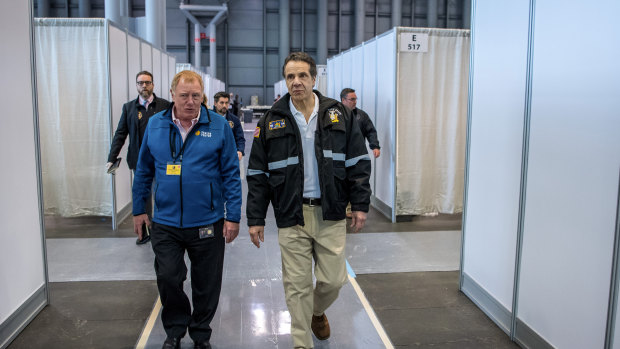 New York Governor Andrew Cuomo walks the corridor of a nearly completed makeshift hospital erected by the US Army Corps of Engineers at the Jacob Javits Convention Centre in New York. 
