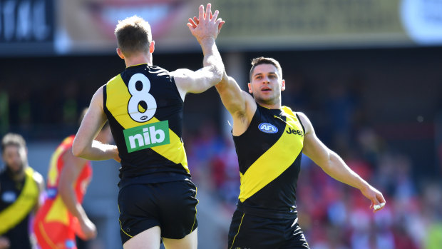Riewoldt and Dion Prestia celebrate another one.