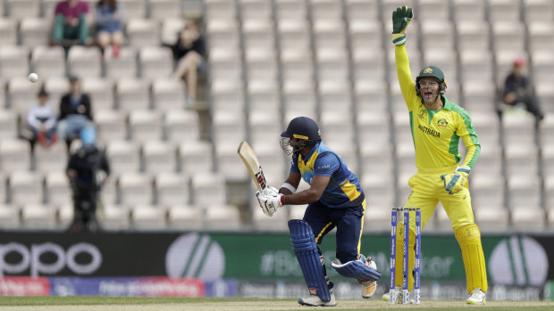 Australia's Alex Carey behind the stumps against Sri Lanka in a World Cup warm-up match.