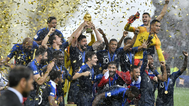France's Olivier Giroud lifts the trophy after France defeated Croatia 4-2.