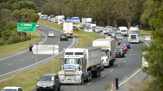 Queues like these, from July, are predicted on Tuesday at the Queensland-NSW road border.