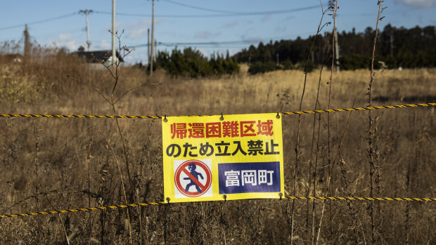 A sign reads "Do not enter" along Route 6 in Tomioka near the Fukushima Daiichi nuclear plant. 