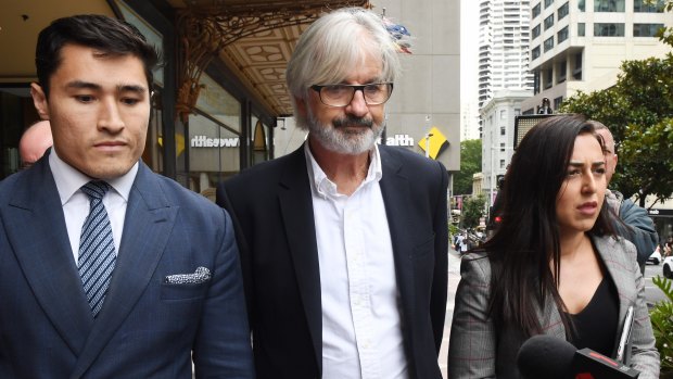 Australian actor John Jarratt leaves the Downing Centre Court in Sydney on Friday