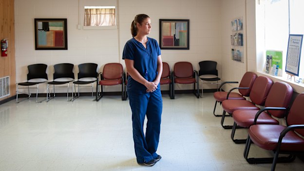 Nurse practitioner Alyssa Simmons stands inside the empty waiting room at the Delta Health Centre in Indianola, Mississippi. 