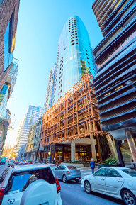 The glass-walled office tower at 16 Claremont Street, South Yarra, has a three-star energy rating.