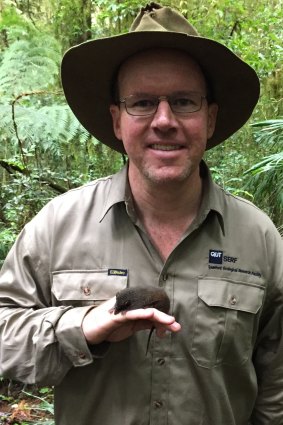 QUT mammalogist Dr Andrew Baker with a female black-tailed dusky antechinus.