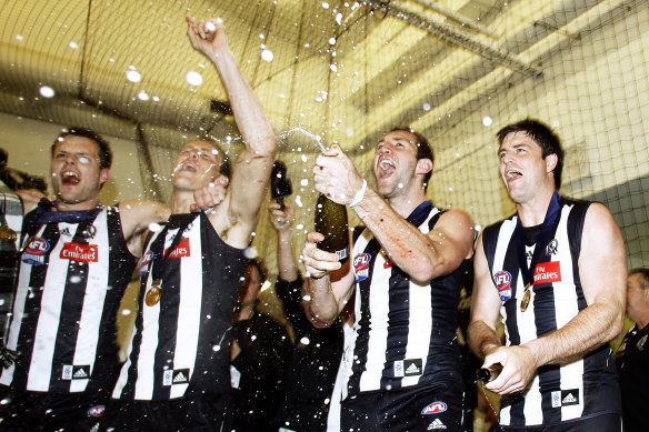 Leigh Brown (far right) celebrating the 2010 premiership with teammates.