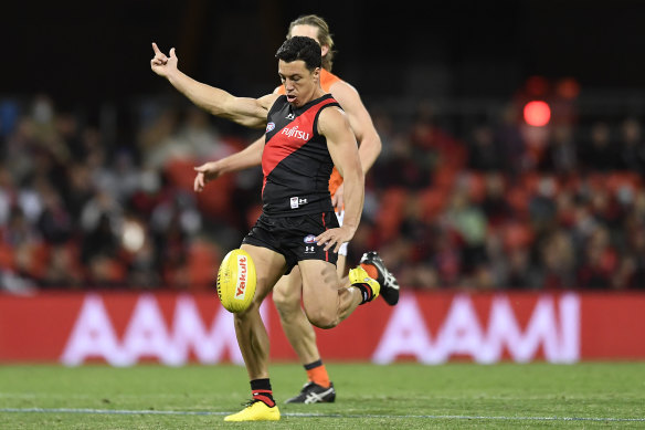 Dylan Shiel gets a kick away against his former side, the Giants, in round 19. 