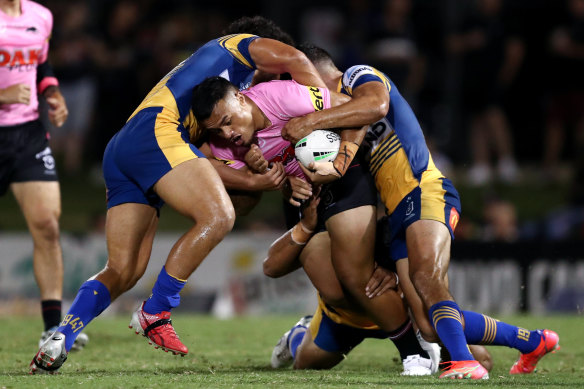 Spencer Leniu carts the ball up against Parramatta on Saturday.