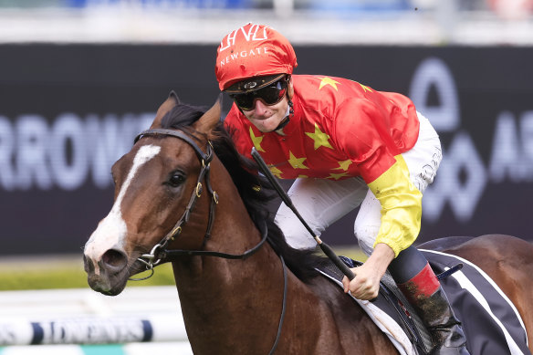 James McDonald grins as Empire Of Japan wins the Breeders Plate.