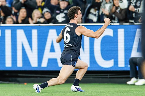 Zac Williams celebrates after kicking a goal in the final quarter.