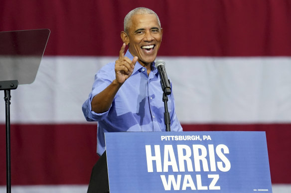 Former president Barack Obama speaks during a campaign rally.