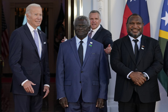Joe Biden with Solomon Islands Prime Minister Manasseh Sogavare, centre, and Papua New Guinea Prime Minister James Marape in Washington last year.