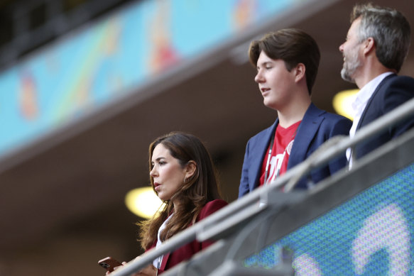 Mary, Crown Princess of Denmark, looks from the stands with her son Prince Christian and husband Crown Prince Frederik at the Euro 2020 in Wembley, London.