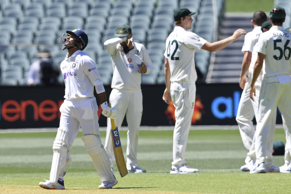 India's Mayank Agarwal walks off after being dismissed during the first Test.