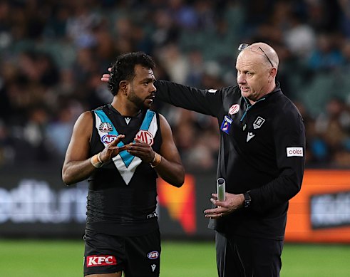 Port coach Ken Hinkley (right) has backed Willie Rioli without condoning behaviour which oversteps the mark 