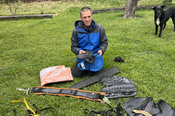 Tony Williams gets his riding gear ready in his backyard for his return to the saddle at Bong Bong on Friday.