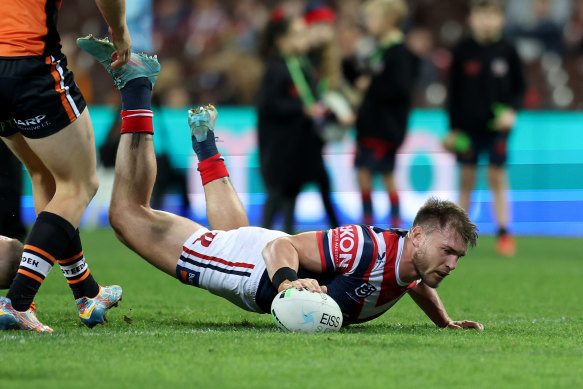 Angus Crichton touches down for the Roosters.