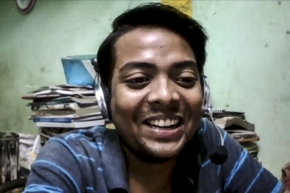 Tushar Joshi, 22, being interviewed by Zoom. He is studying remotely for his masters from his home in one of India’s largest slums. 