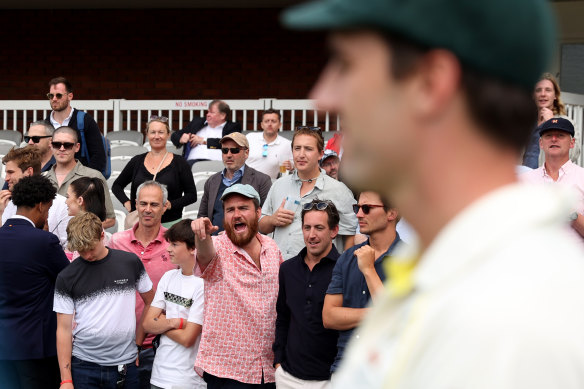 Australian captain Pat Cummins looks on as fans have their say at Lord’s.