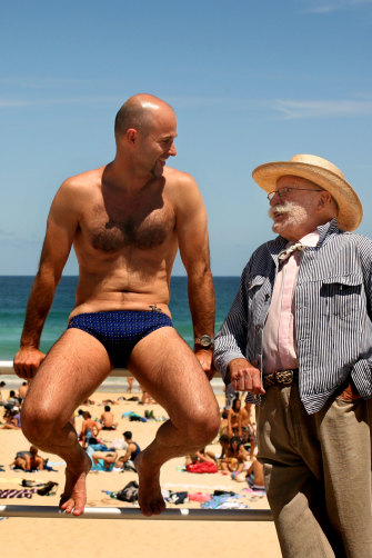 Swimwear designer Peter Travis with his nephew, Jamie Travis, at Bondi Beach in 2008. 