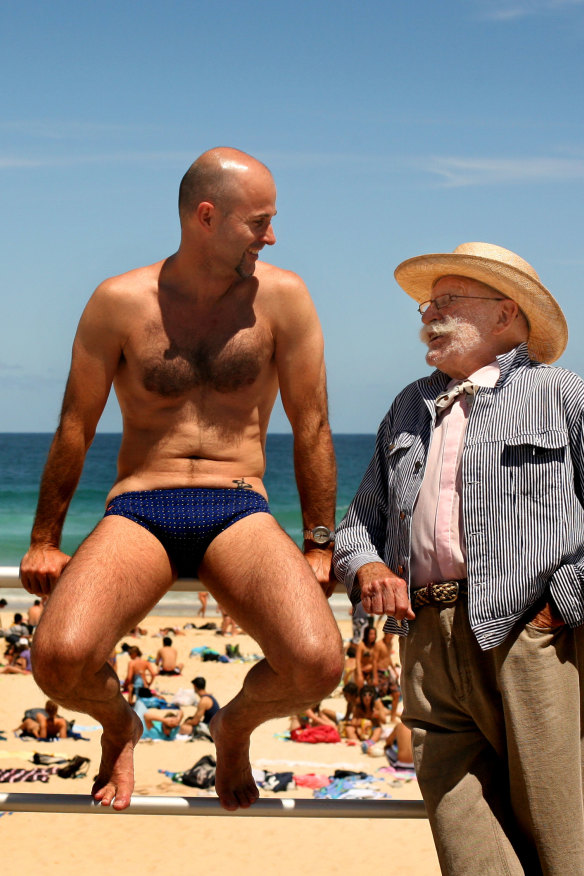 Swimwear designer Peter Travis with his nephew, Jamie Travis, at Bondi Beach in 2008. 