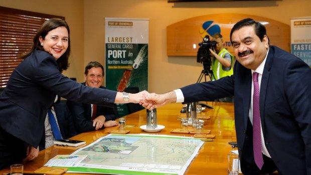 Gautam Adani, pictured with Queensland Premier Annastacia Palaszczuk, has revealed when the first coal will be produced at the Carmichael mine.
