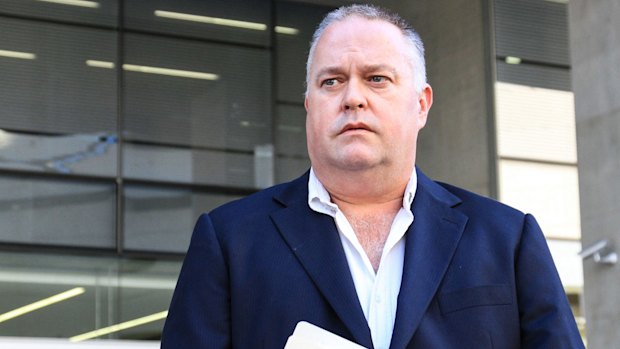 Alleged whistleblower cop Rick Flori leaves the Brisbane Supreme Court.