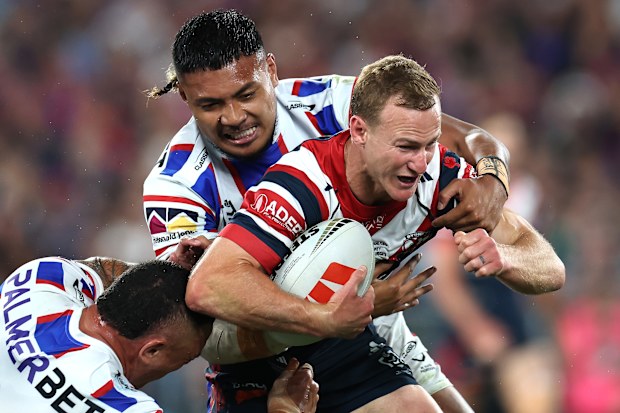  Cherry-Evans is tackled during the NRL grand final.