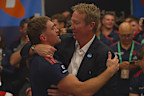 Connor Watson embraces coach Trent Robinson.