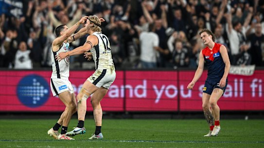 Sheer joy: The Blues react after the final siren.