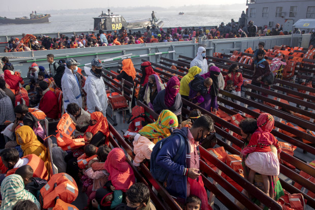 Unable to return to Myanmar for fear of persecution, these Rohingya refugees are on a Bangladesh navy vessel, being moved from an overcrowded camp on mainland Bangladesh to Bhasan Char island, In late December.