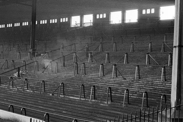 The Anfield Kop as it used to be: full of terracing.