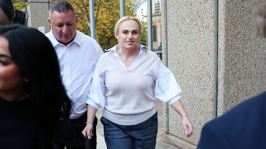 Wilson leaves Federal Court after a day of testimony.