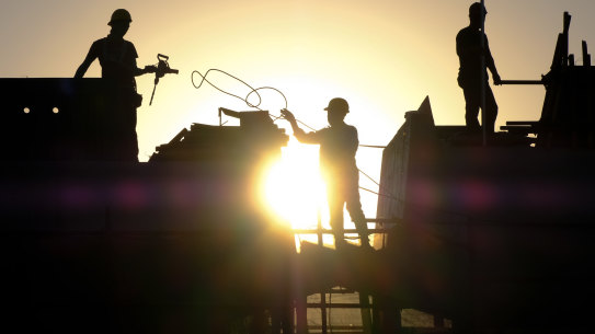 Migrant workers at a construction site in Beijing. 
