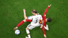 Gavi of Spain battles for possession with Germany’s David Raum. 