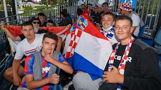 Markus Rajic (bottom left) with the Croatian flag and his mates at the Australian Open.