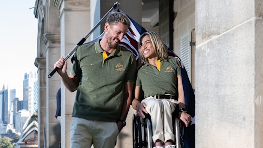 Australian Paralympian flag-bearers Brenden Hall and Madison de Rozario.