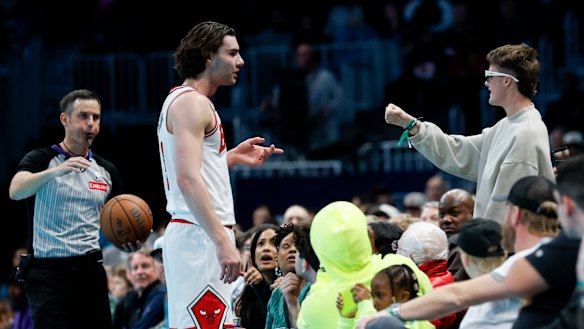 Close confrontation: Josh Giddey clashes with the fan, who was sitting courtside.