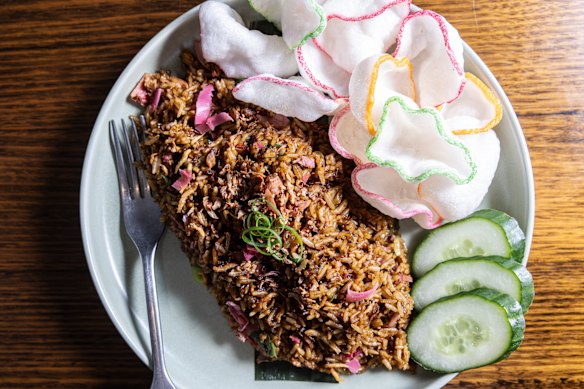 Nasi goreng teri kecombrang, fried rice with crispy anchovies and torch ginger flower.
