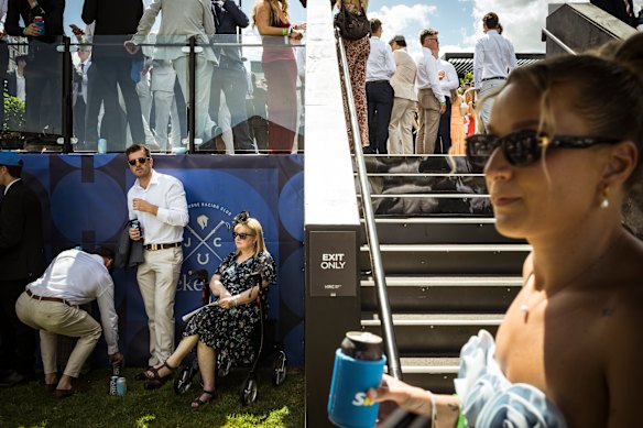 Diane Stevenson takes some shade and shelter from the young crowd.