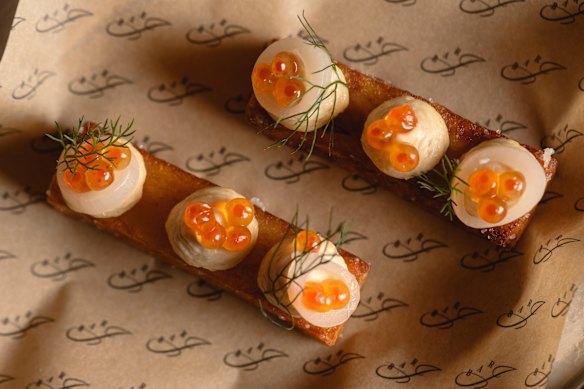 The Fish + Chip snack with smoked salmon taramasalata, lightly pickled eschalot and neon-orange roe.