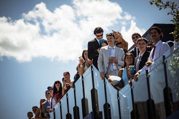 Racegoers enjoy the spring weather at Caulfield Cup.