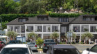 The three-storey development includes five luxury apartments (artist impression).